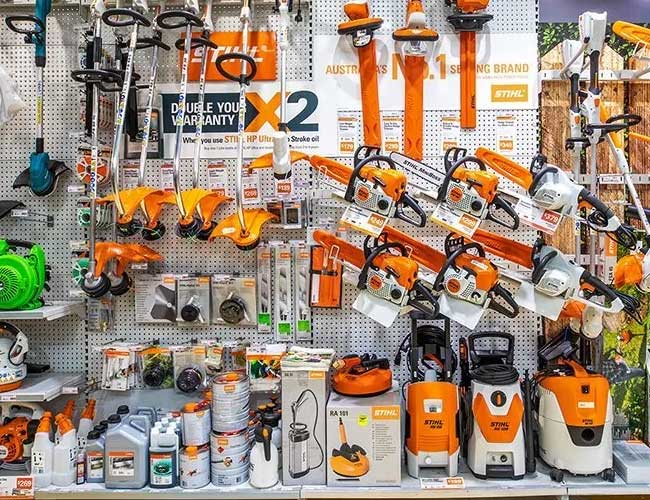 A close-up of a STIHL chainsaw bar and chain, highlighting the brand.